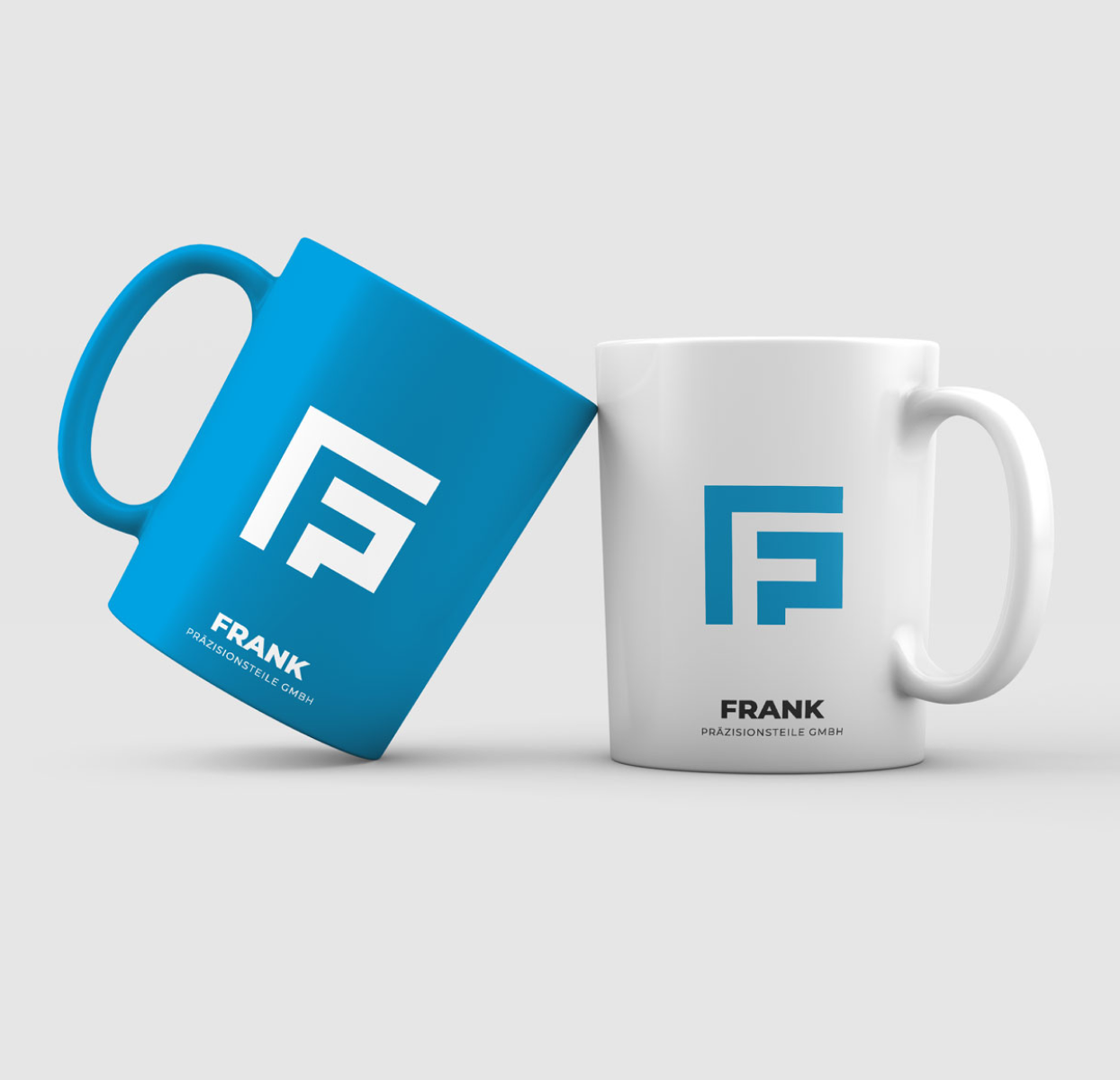 Eine Tasse mit dem neuen Branding von Frank Präzisionsteile